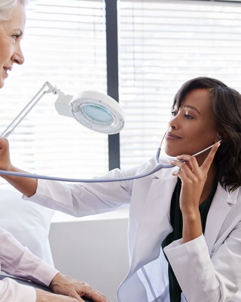 woman-patient-having-medical-exam-with-female-doct-2023-11-27-05-21-53-utc